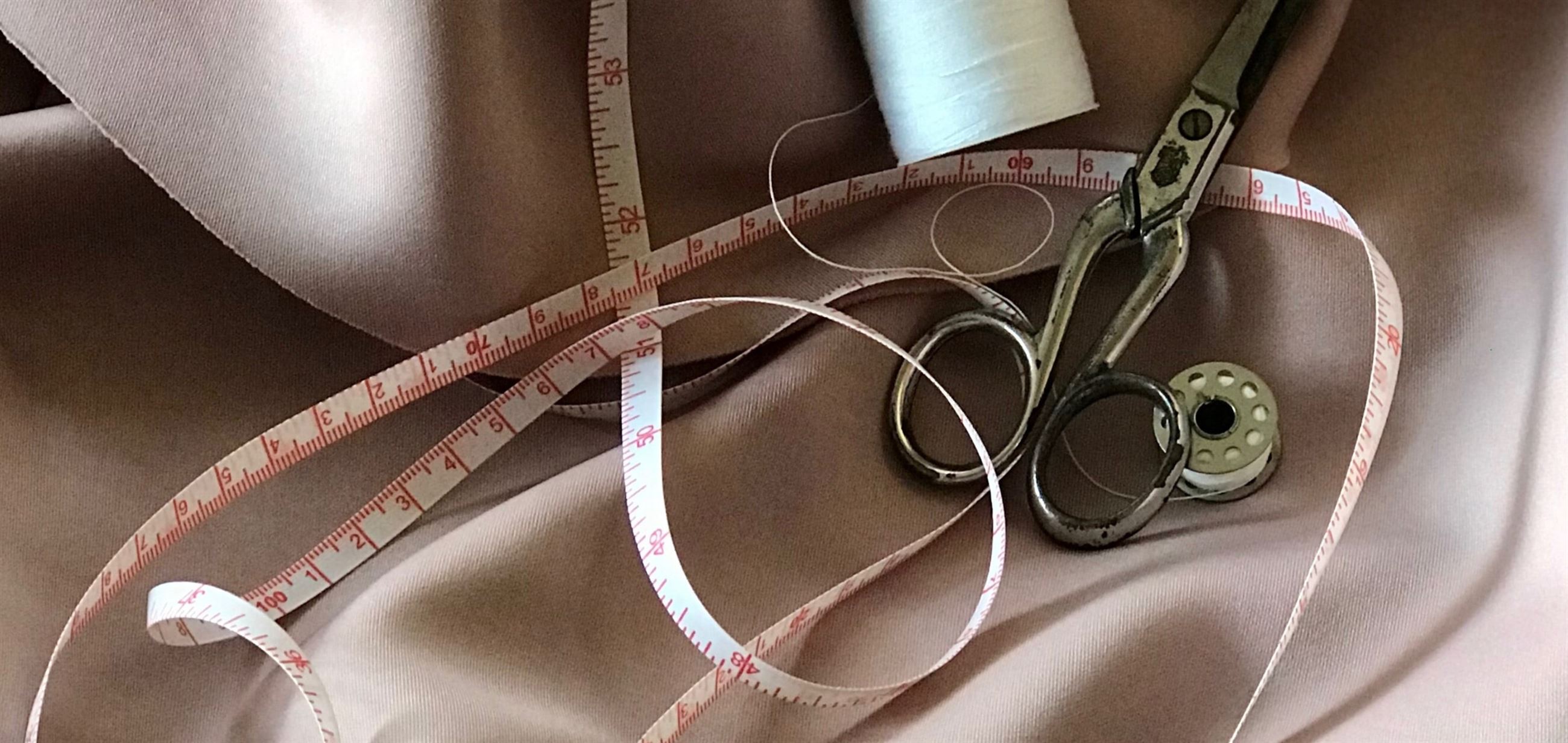 Scissors, tape and thread. Alterations Desktop Background